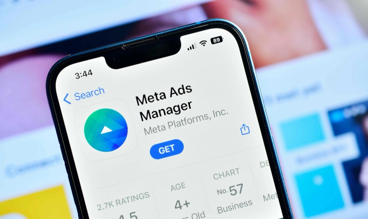 A phone showing the Meta Ads Manager app